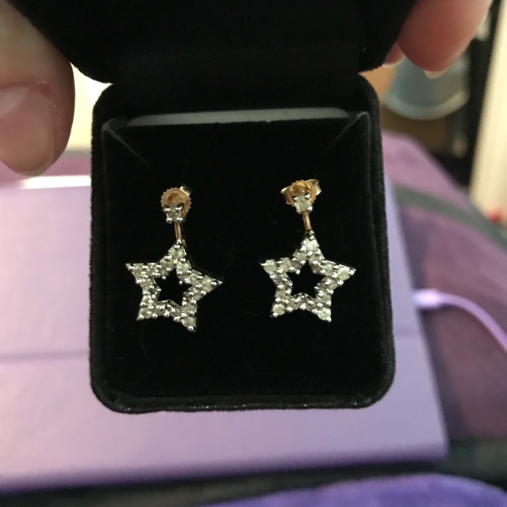 Gold Star shaped earrings. With Diamonds.